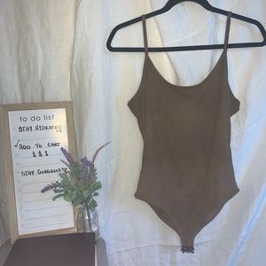 brown bodysuit